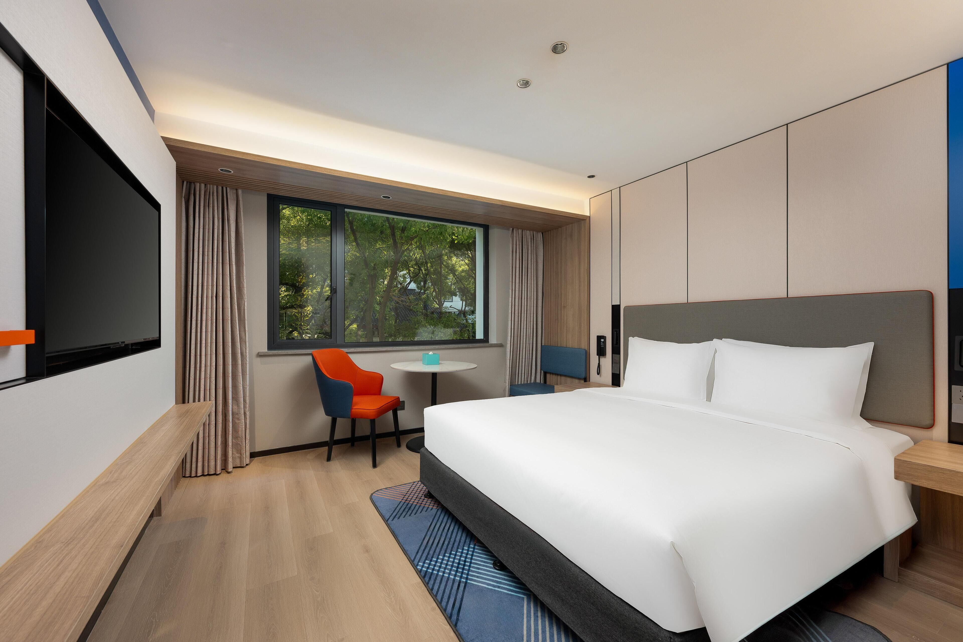 Premium bedding, down duvets, desk, laptop workspace