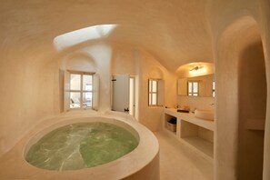 Premium Spa Room with Indoor Hot tub Caldera View | Bathroom | Shower, eco-friendly toiletries, hair dryer, bathrobes