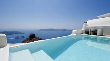 Outdoor pool, open 8:00 AM to 7:00 PM, pool umbrellas, sun loungers