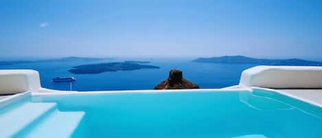 Outdoor pool, open 8:00 AM to 7:00 PM, pool umbrellas, sun loungers