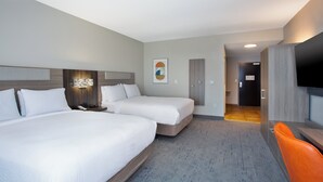 A hotel room with two beds, a desk, a TV, and a bathroom visible through an open door. - Holiday Inn Express Augusta North by IHG (Augusta)