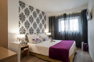 Down comforters, minibar, desk, blackout drapes