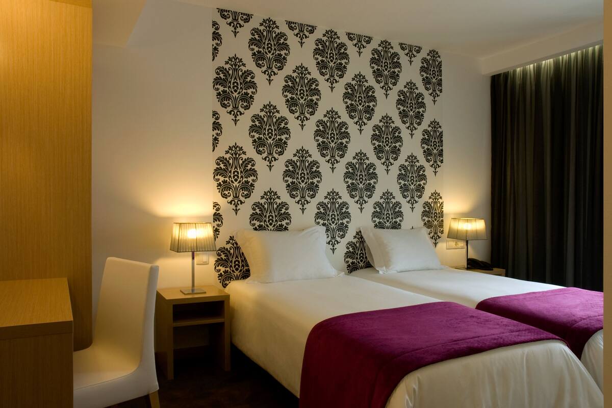 Down comforters, minibar, desk, blackout drapes