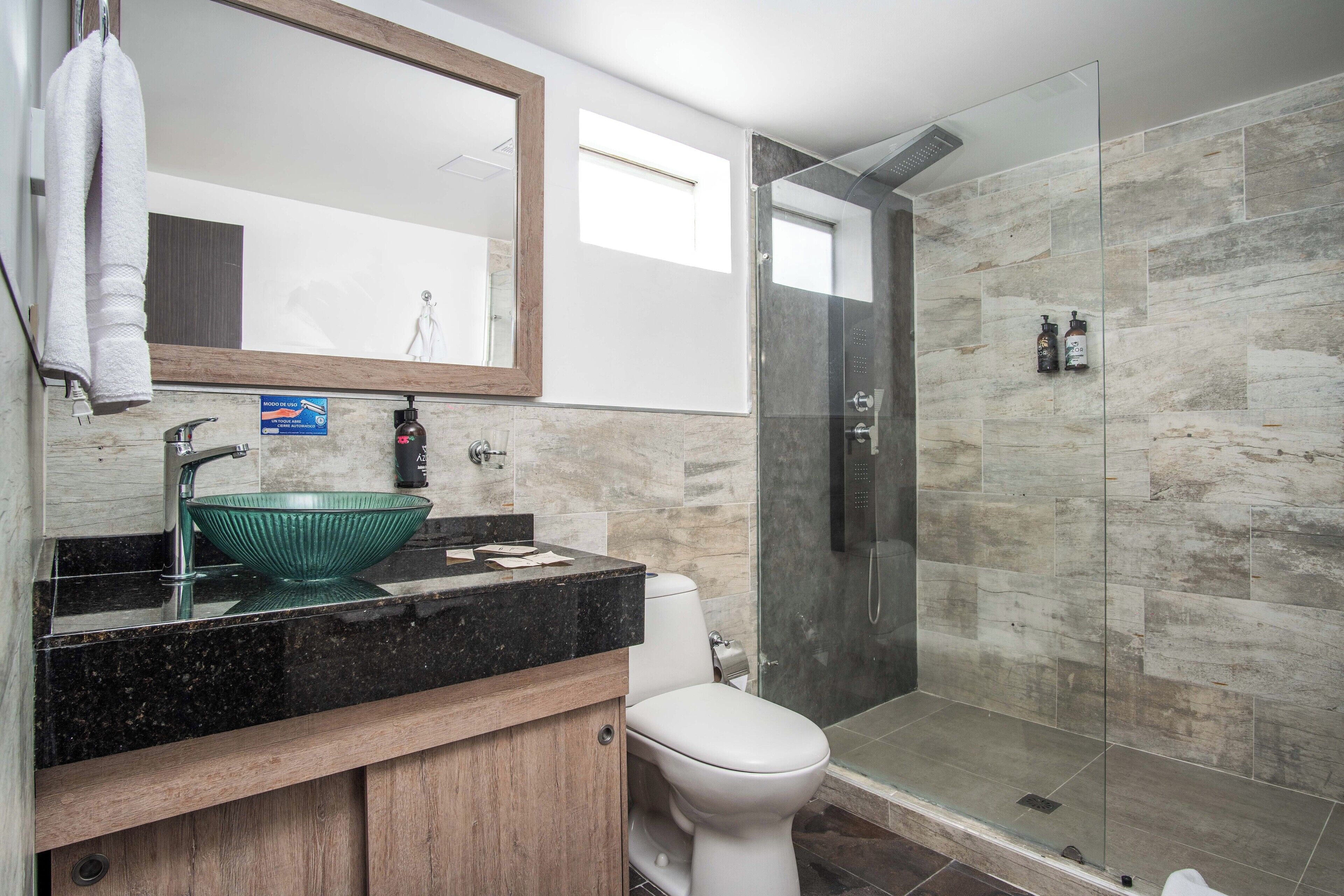 superior room, 1 king bed | bathroom | shower, rainfall showerhead, free toiletries, hair dryer