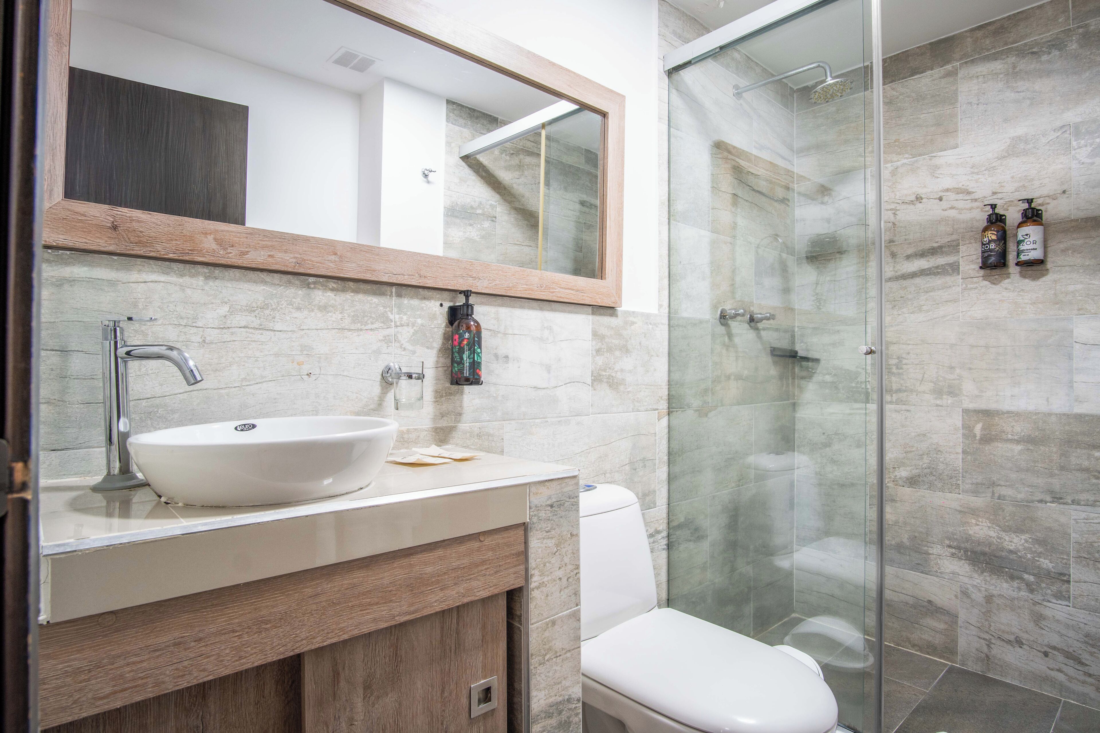 superior deluxe | bathroom | shower, rainfall showerhead, free toiletries, hair dryer