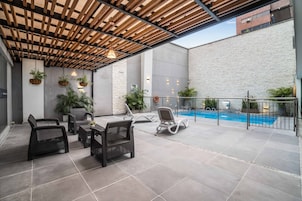 Outdoor pool, open 9:00 AM to 9:00 PM, sun loungers