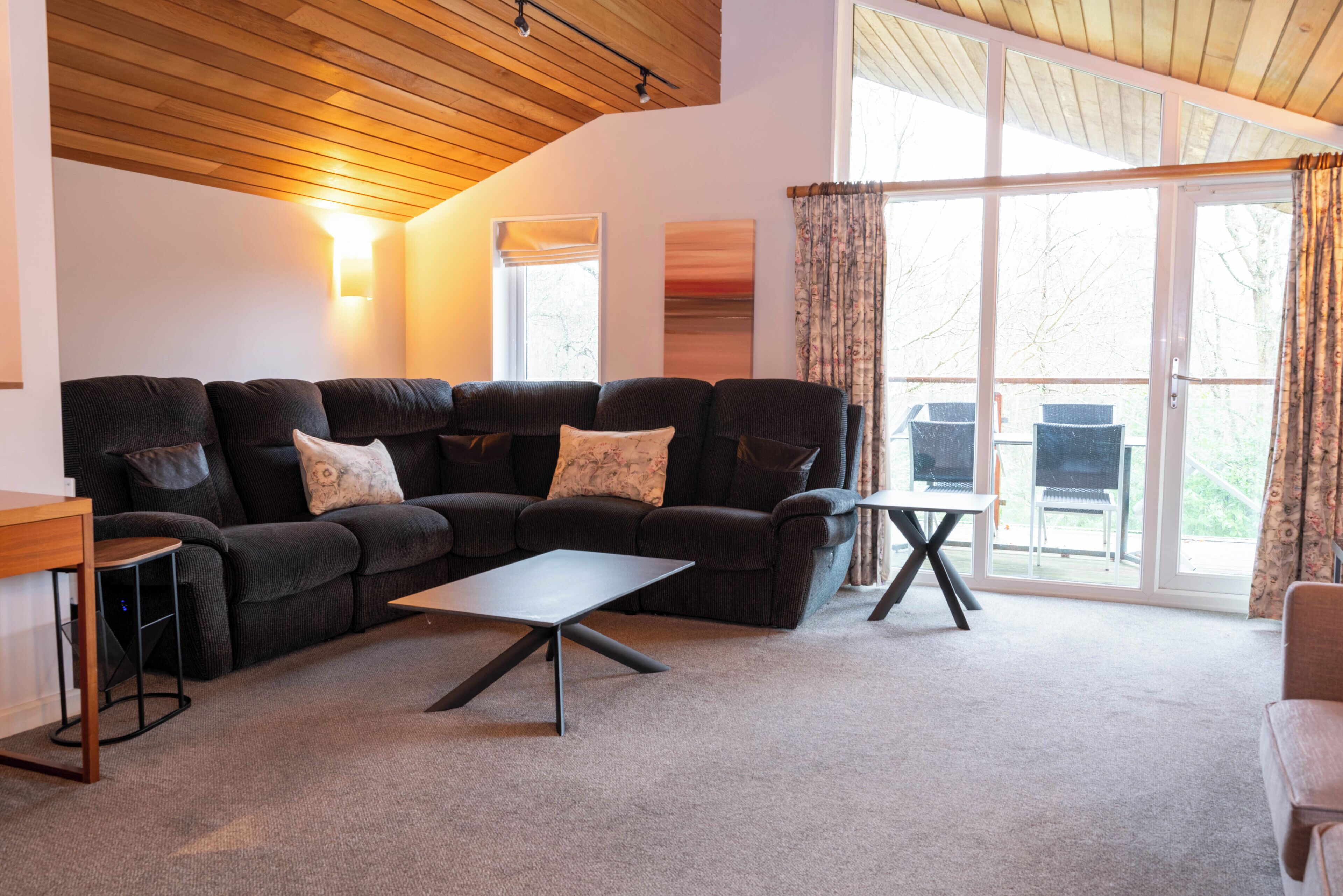 Three-Bedroom Lodge | Living area | Flat-screen TV