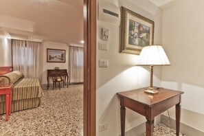 Classic Double or Twin Room | Minibar, in-room safe, desk, iron/ironing board