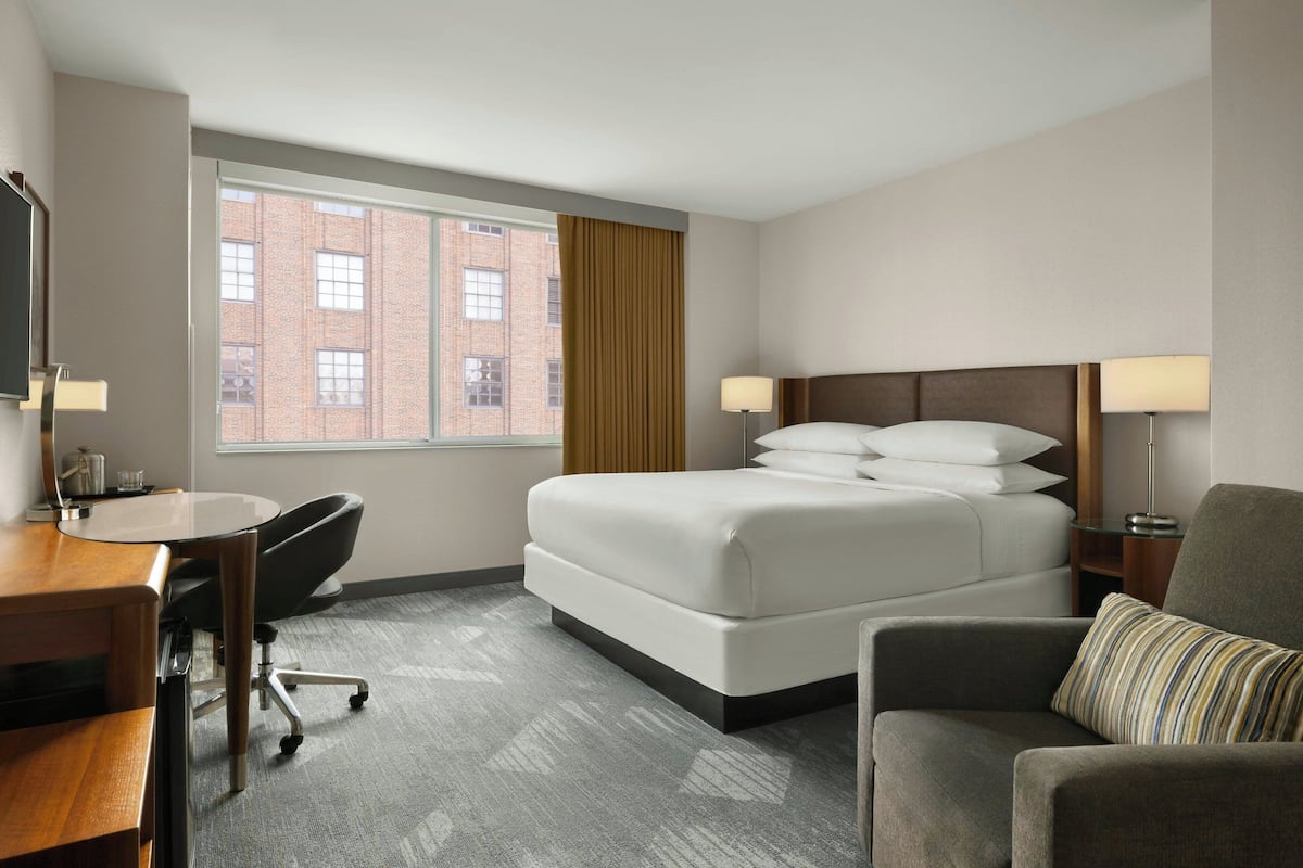 Down duvets, pillow-top beds, in-room safe, desk