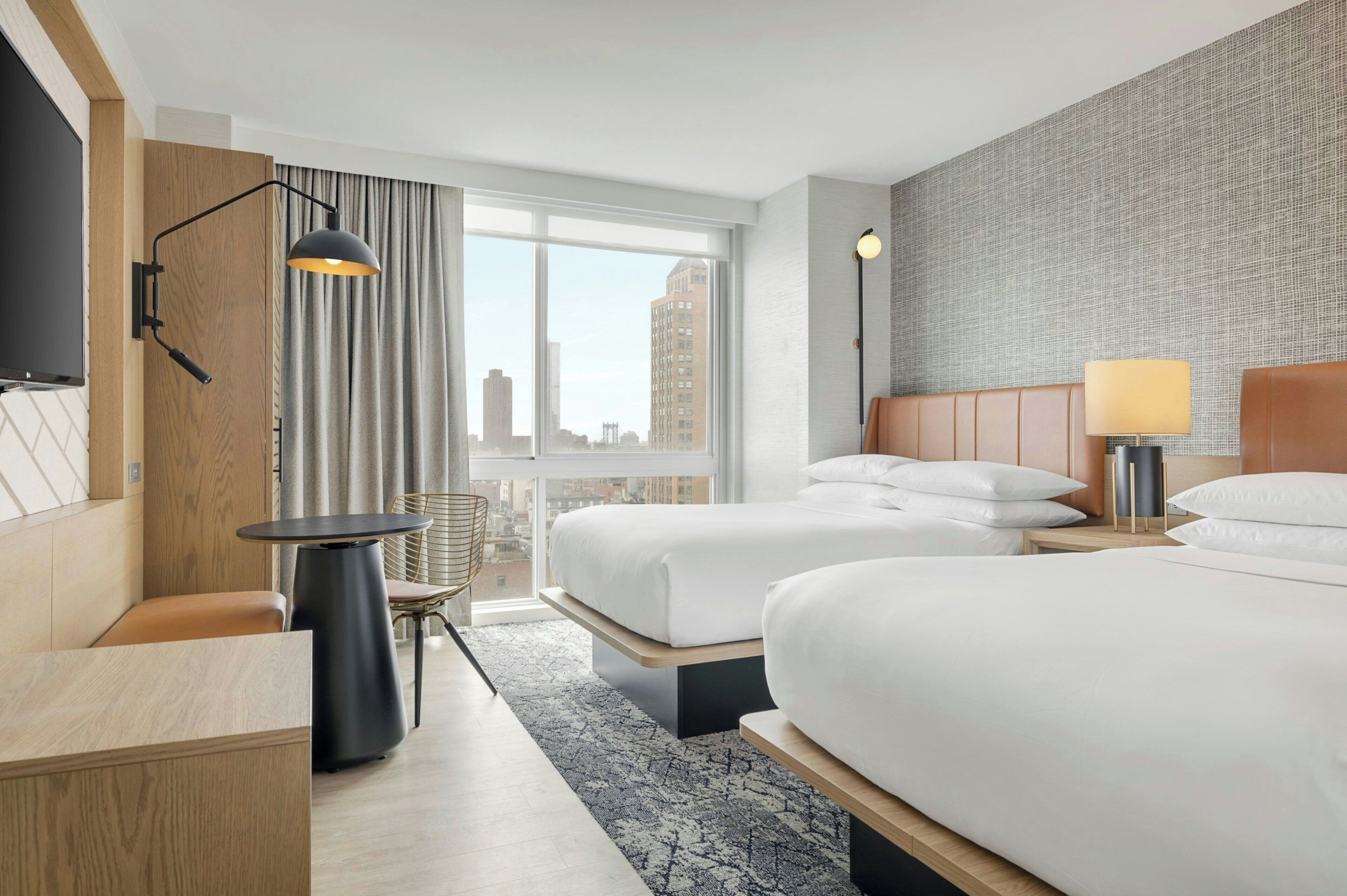 Down duvets, pillow-top beds, in-room safe, desk