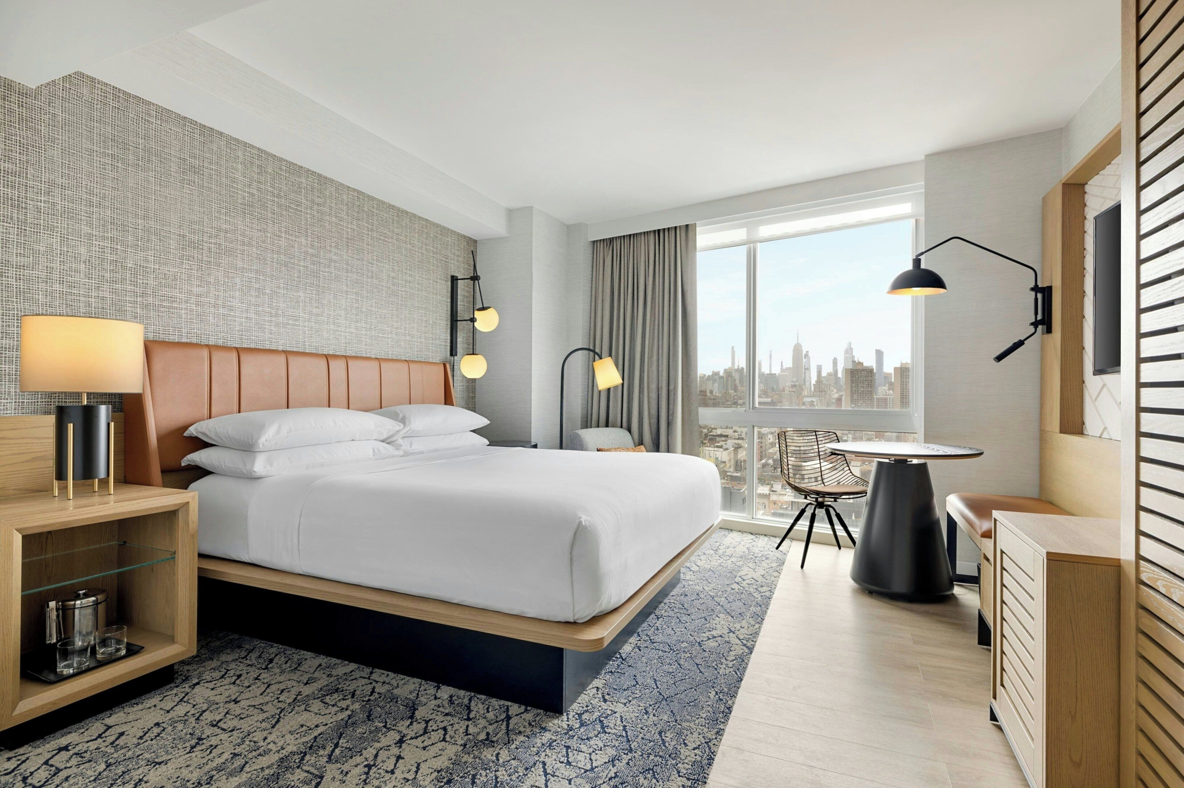 Down duvets, pillow-top beds, in-room safe, desk