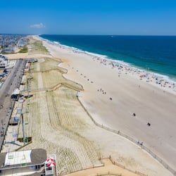 On the beach, white sand, surfing