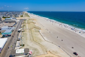 On the beach, white sand, surfing - Boardwalk Hotel Charlee & Beach House Rentals (Seaside Heights)