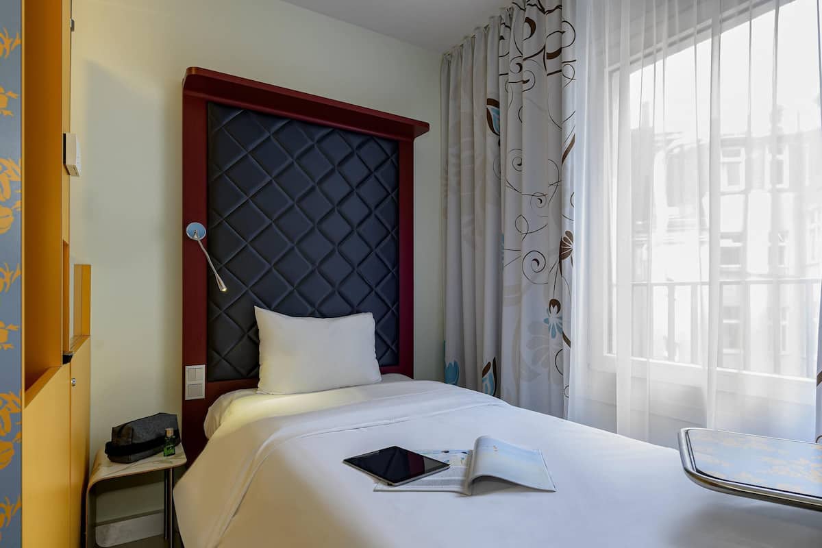 Blackout curtains, soundproofing, rollaway beds, free WiFi