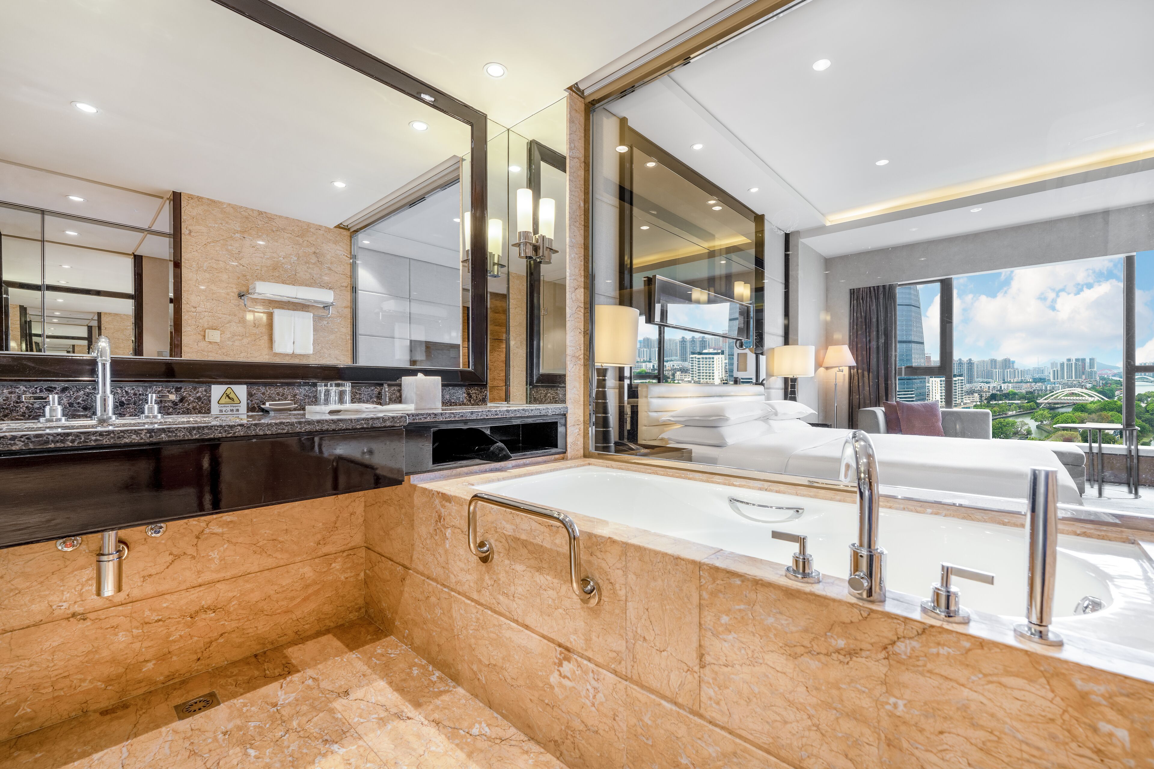 room, 1 king bed, river view | bathroom | separate bathtub and shower, deep-soaking bathtub, rainfall showerhead