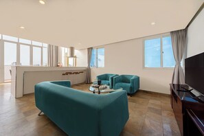 Family Suite | Living area | 32-inch TV with cable channels - A25 Hotel - 12 Ngo Sy Lien (Hanoi)