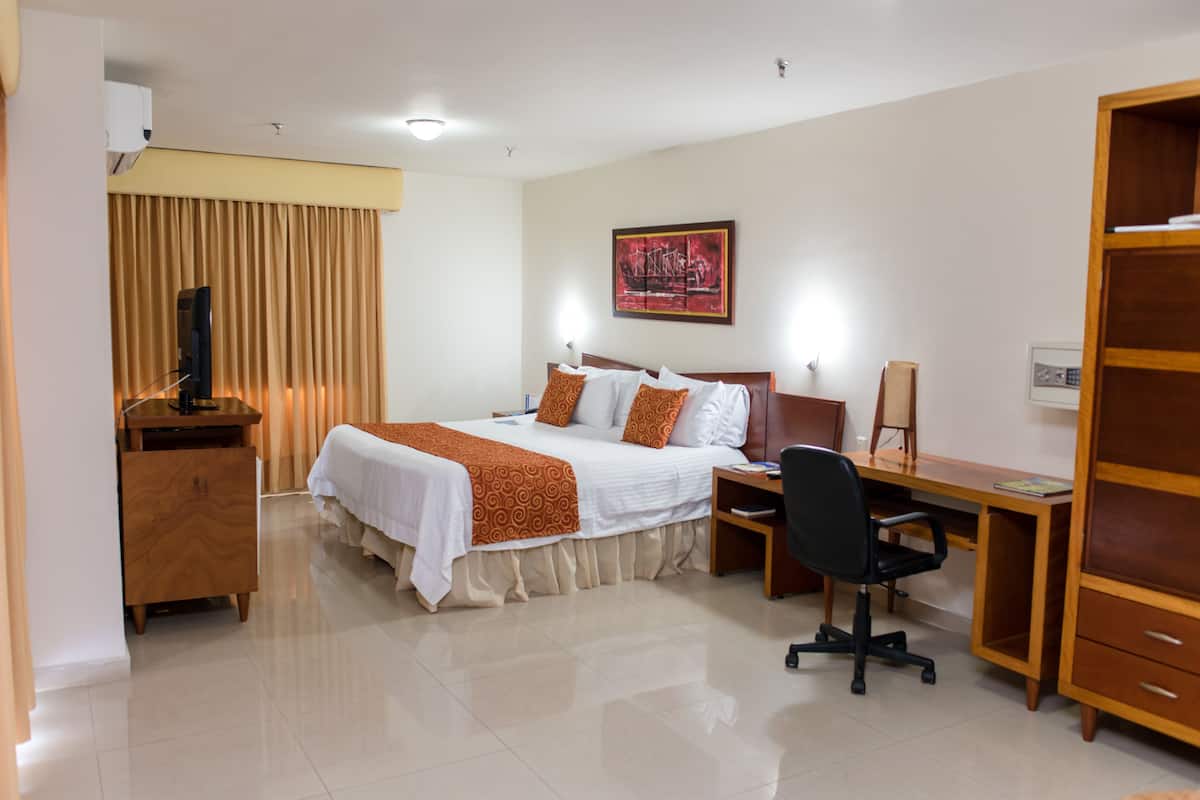 Suite, 1 King Bed | Premium bedding, minibar, in-room safe, individually decorated