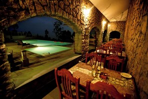 Breakfast, lunch, dinner served; international cuisine, pool views