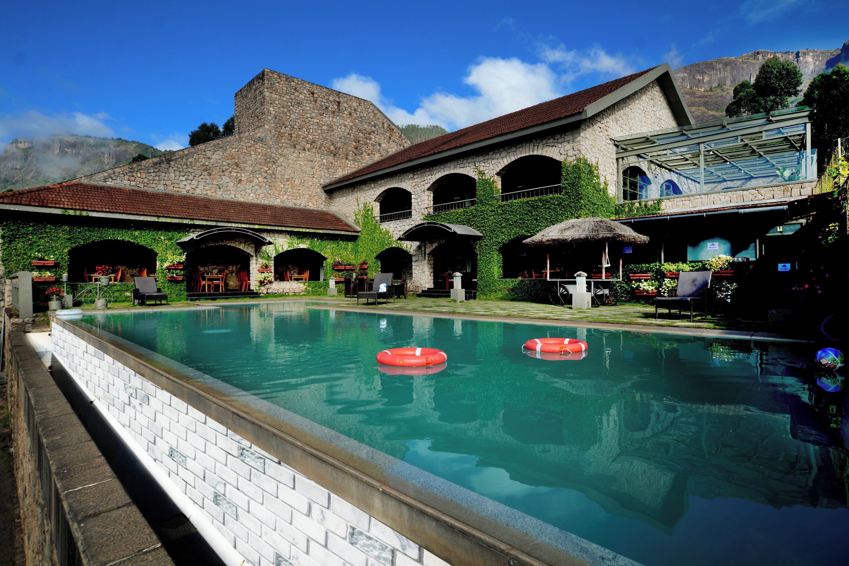 Outdoor pool, pool umbrellas, pool loungers