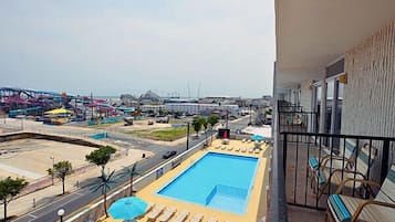 Seasonal outdoor pool, pool loungers