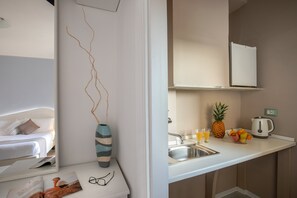 Habitación triple | Minibar, escritorio, wifi gratis y ropa de cama