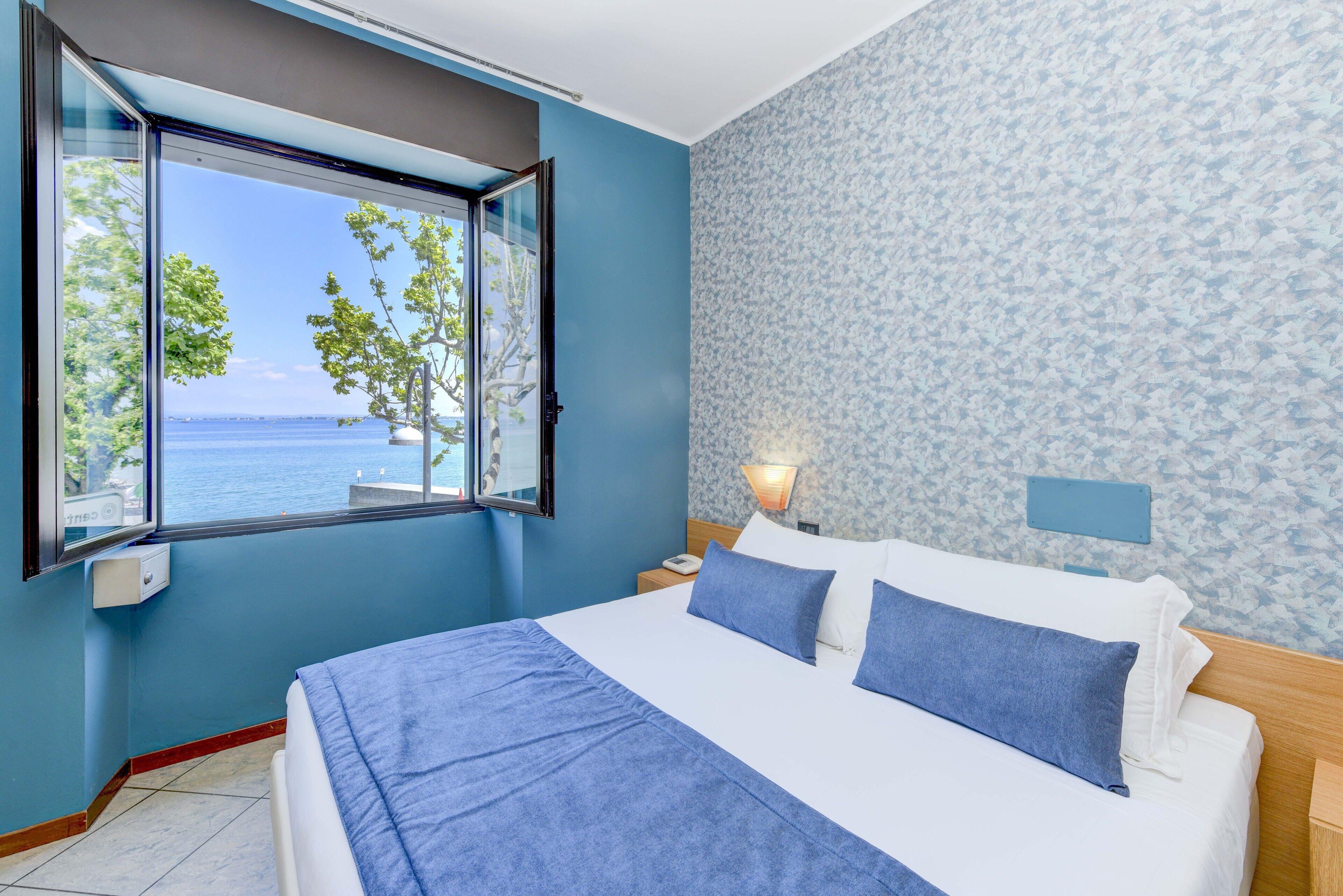 classic room, lake view | 1 bedroom, hypo-allergenic bedding, pillow-top beds, minibar