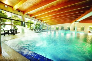 Indoor pool, seasonal outdoor pool, pool umbrellas, pool loungers