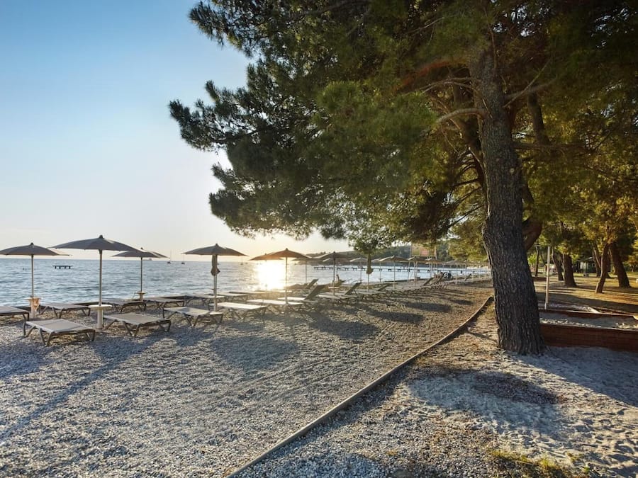 On the beach, beach umbrellas, beach volleyball, 2 beach bars