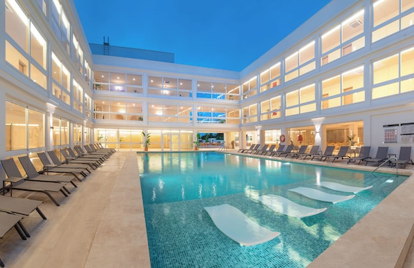 Outdoor pool, pool umbrellas, pool loungers