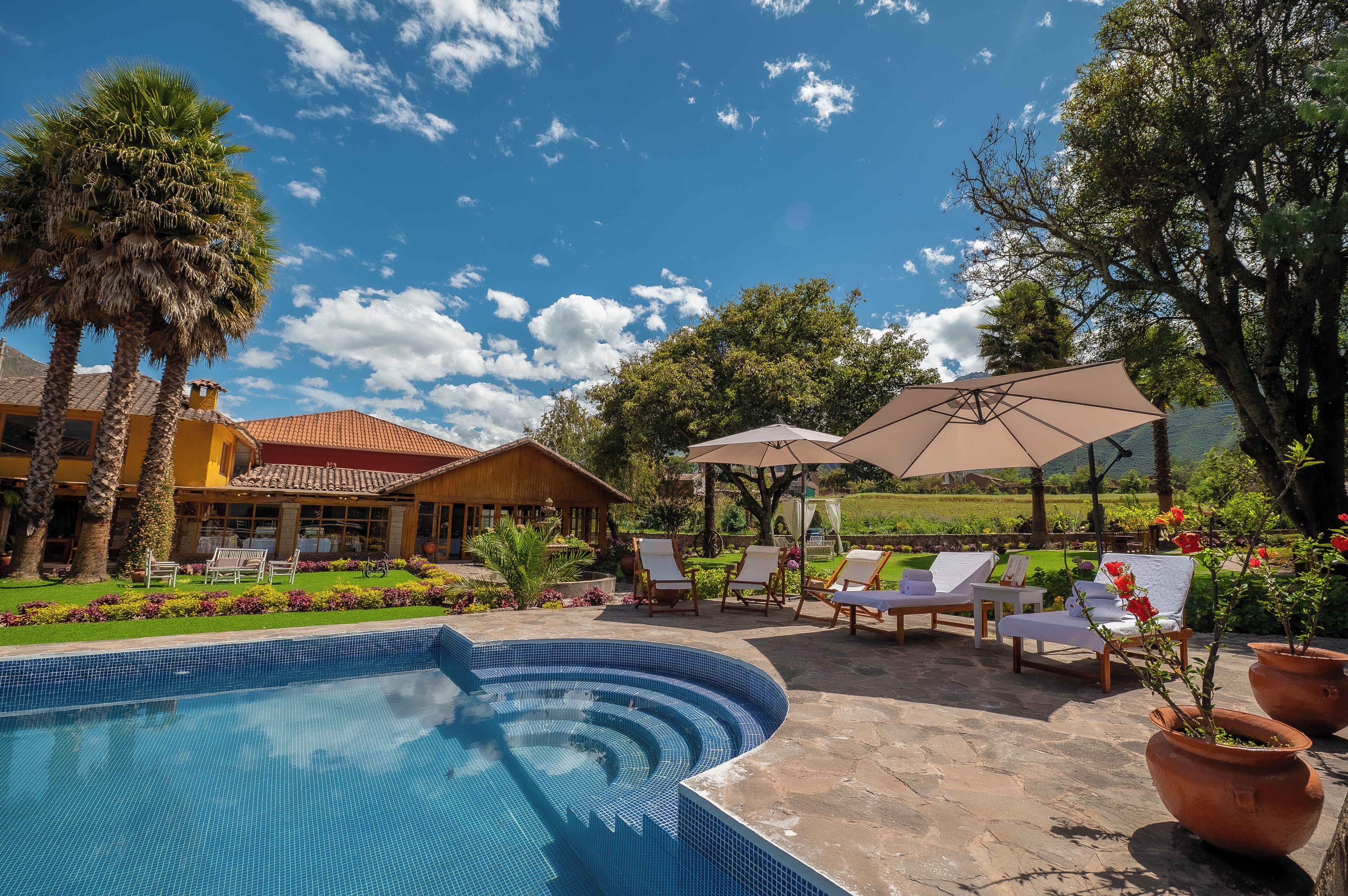 Seasonal outdoor pool, open 7:00 AM to 4:30 PM, pool umbrellas