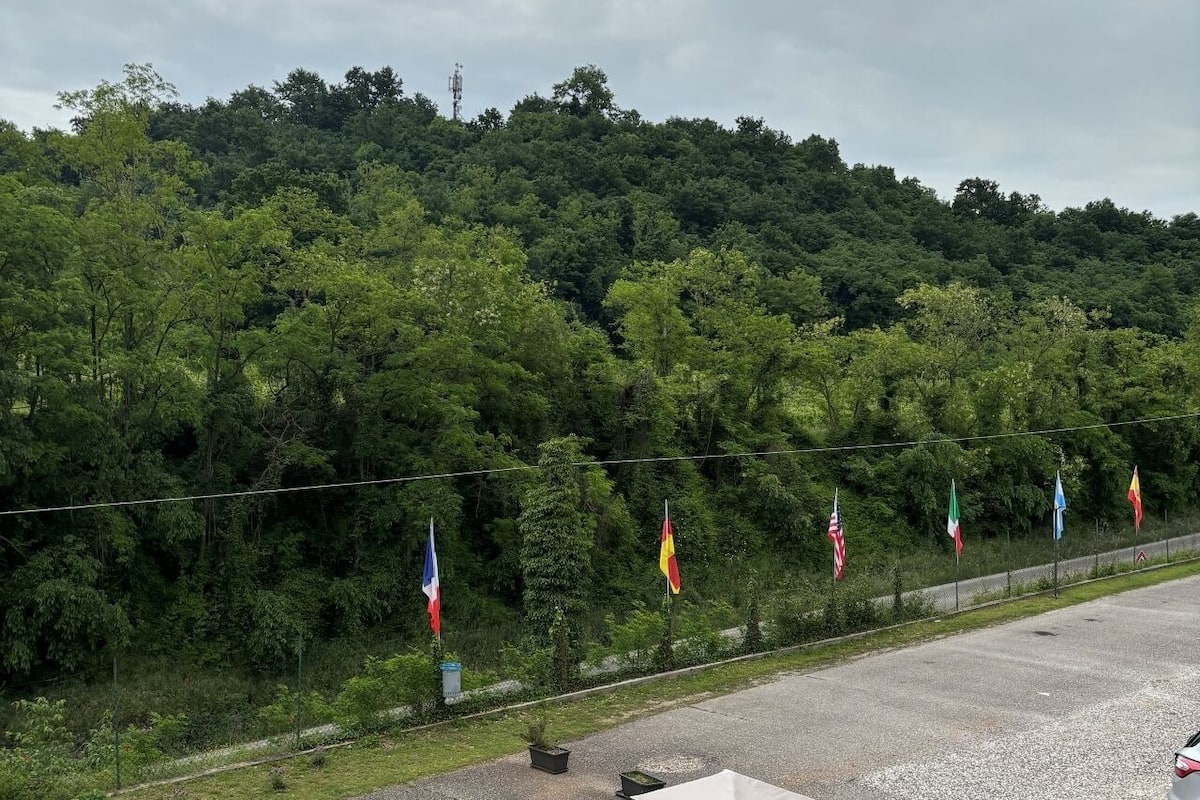 premium bedding, desk, laptop workspace, blackout curtains