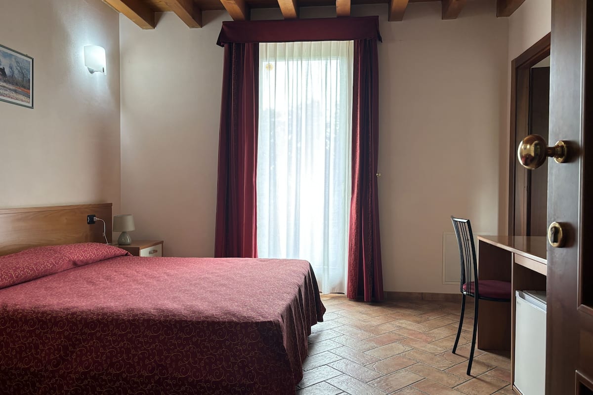 standard double room | premium bedding, desk, laptop workspace, blackout curtains