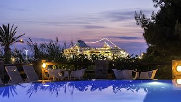 Seasonal outdoor pool, pool loungers