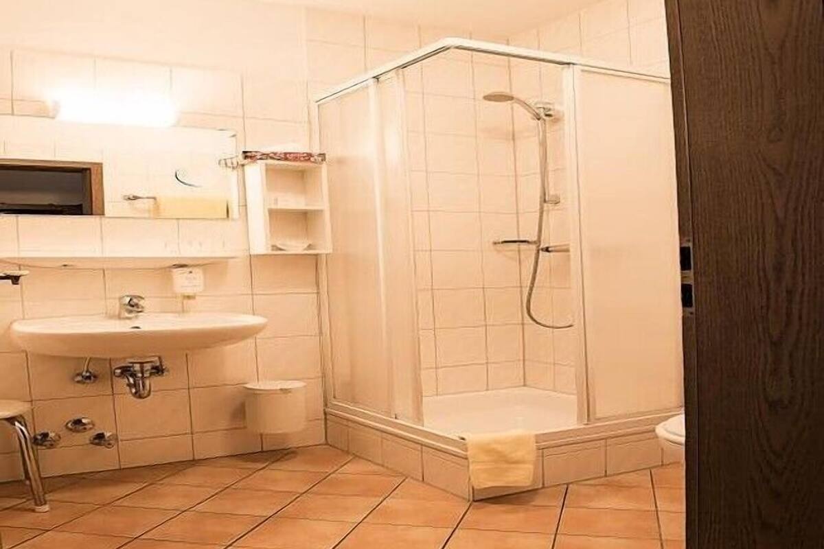 shower, hair dryer, dressing gowns, towels