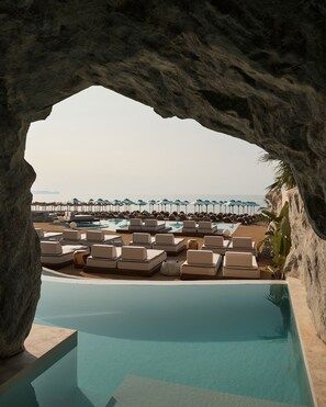 Cave Oasis Seafront Suite with Private Pool & Indoor Hydromassage Bathtub | 1 bedroom, premium bedding, minibar, in-room safe - Uzenie All Suites Boutique Resort (Rethymno)