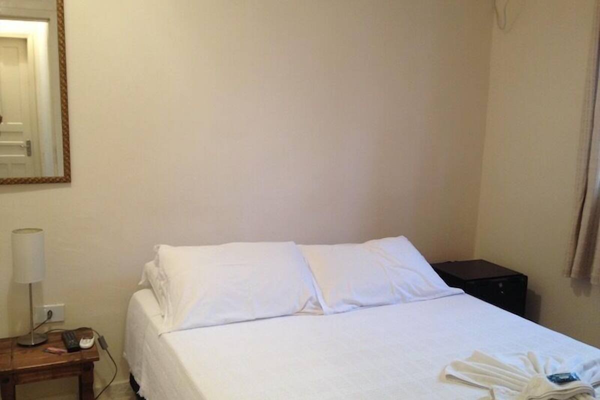 Suite Duplo Economico vista para montanha 2nd piso | Minibar, in-room safe, blackout curtains, rollaway beds