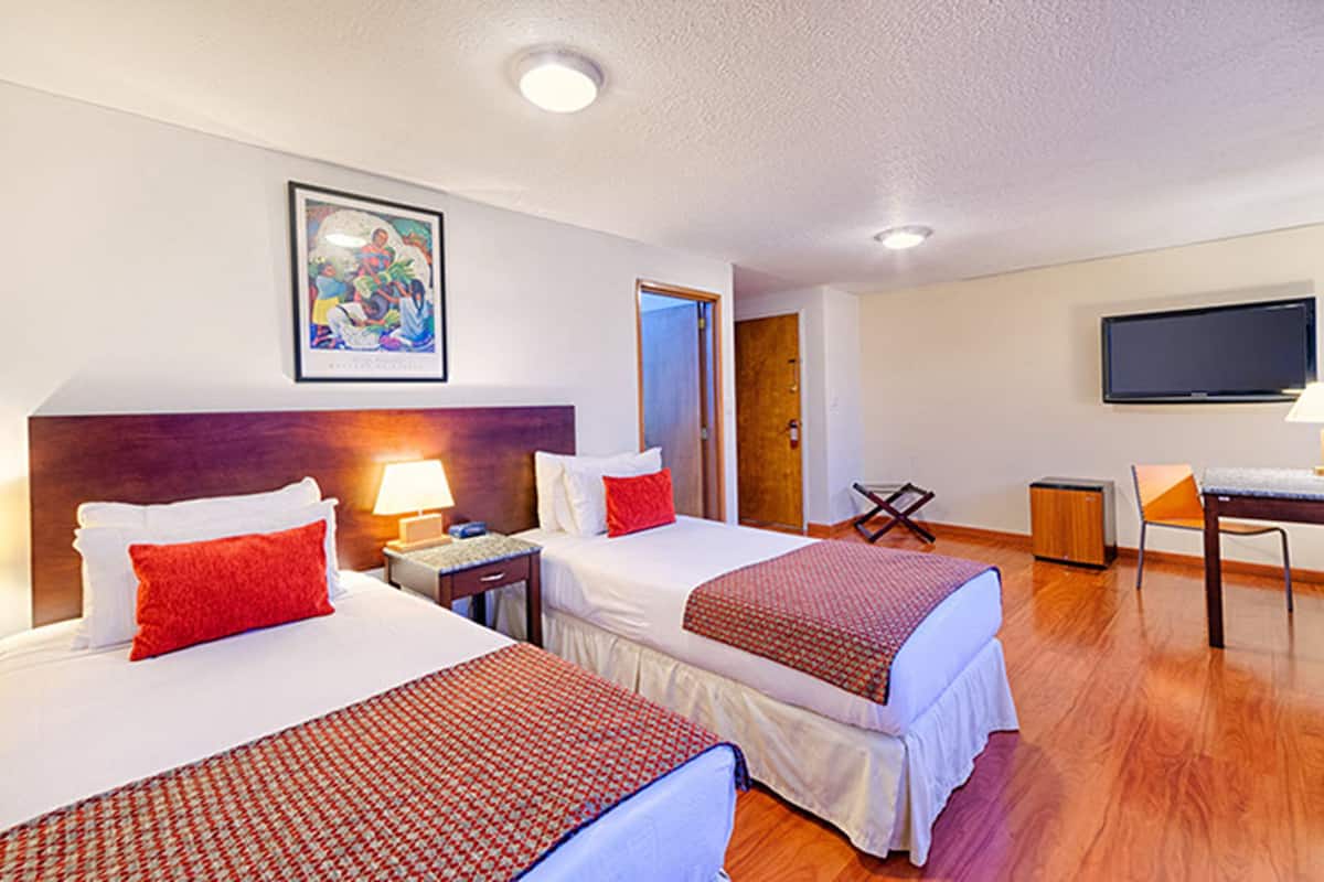Superior Twin Room | Minibar, in-room safe, desk, iron/ironing board