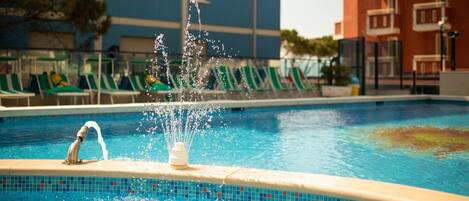 Seasonal outdoor pool, pool umbrellas, sun loungers