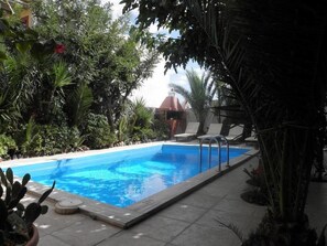 Outdoor pool, pool umbrellas, pool loungers
