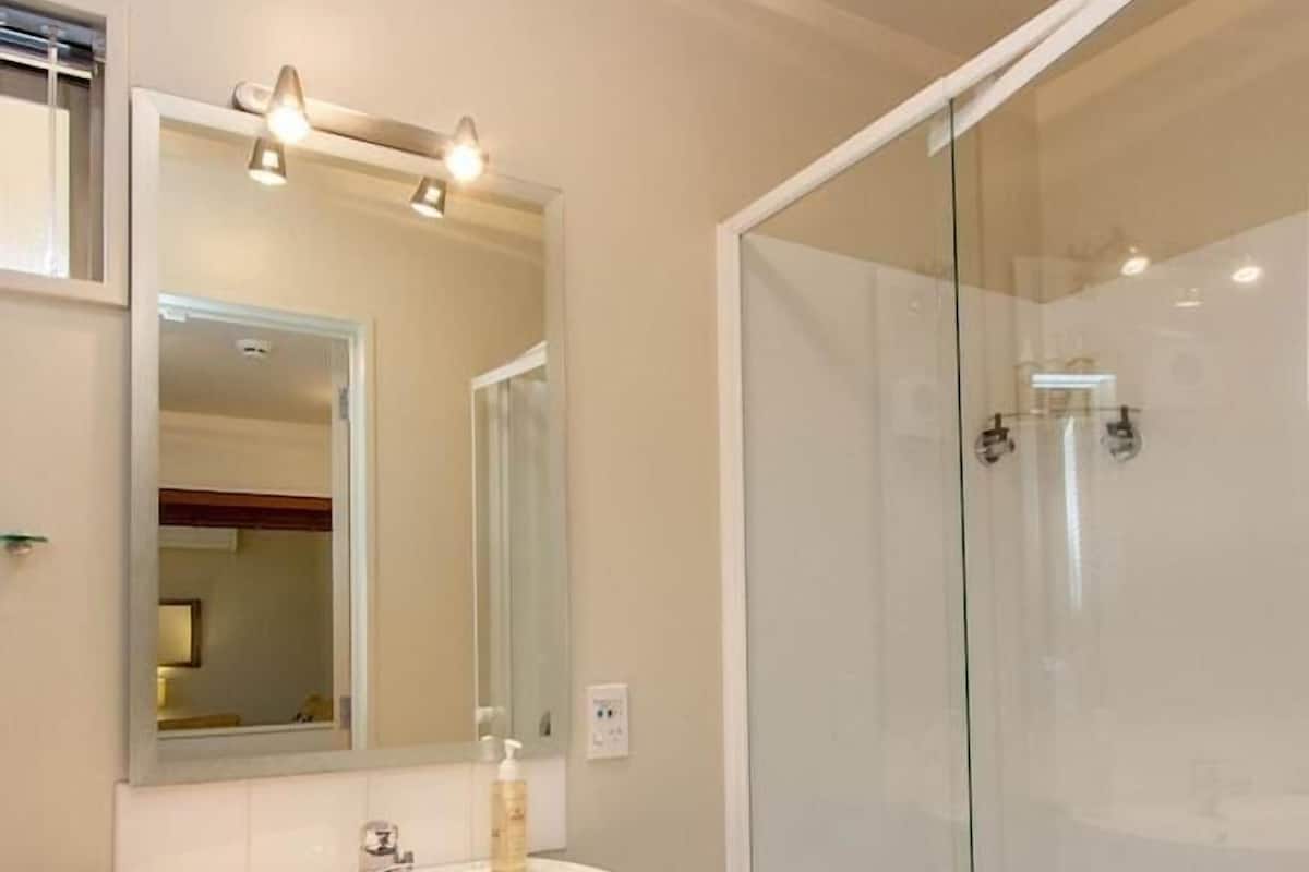Bathroom | Designer toiletries, hair dryer, towels
