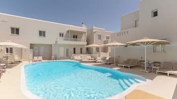 Outdoor pool, pool umbrellas, pool loungers