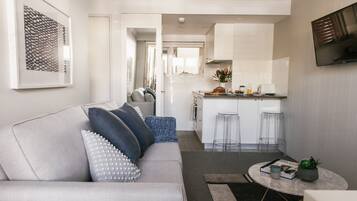 One Bedroom Apartment | Living room | 42-inch TV with digital channels, Netflix, streaming services