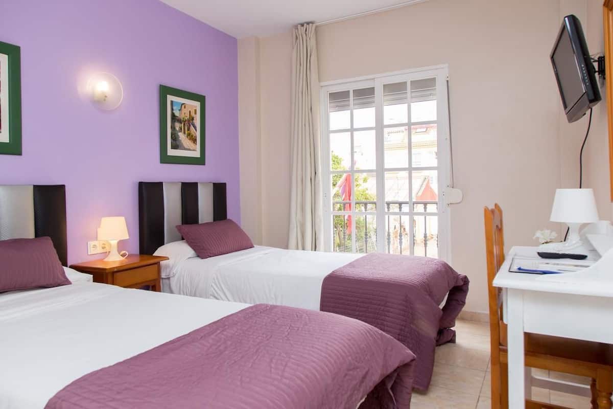 Twin Room | Pillowtop beds, in-room safe, desk, iron/ironing board (on request)