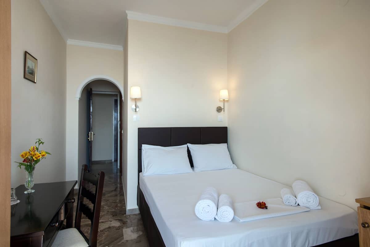 Habitación individual clásica, vista al mar | Caja de seguridad en la habitación, wifi gratis y ropa de cama