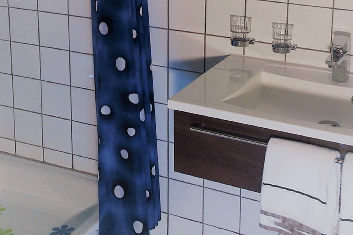 shower, hair dryer, bathrobes, towels