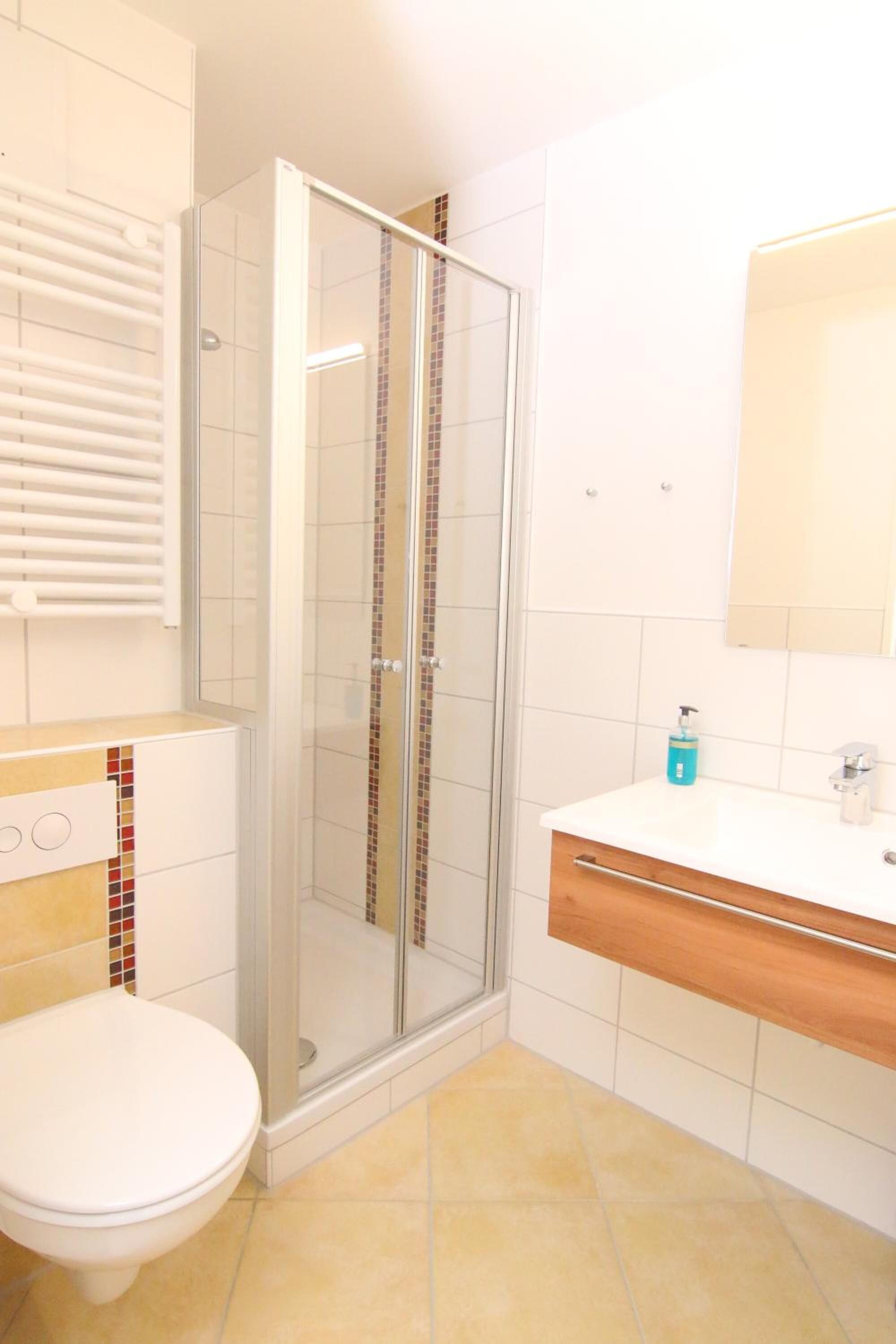 shower, hair dryer, bathrobes, towels