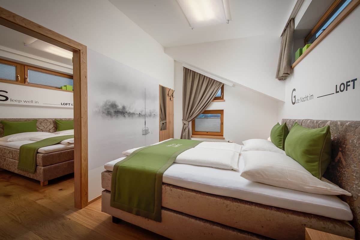 Suite, 2 Bedrooms | Hypo-allergenic bedding, individually decorated, desk, soundproofing