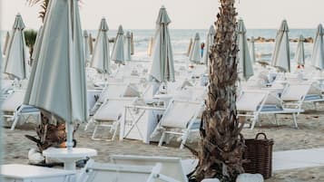 Private beach, sun loungers, beach umbrellas, beach towels