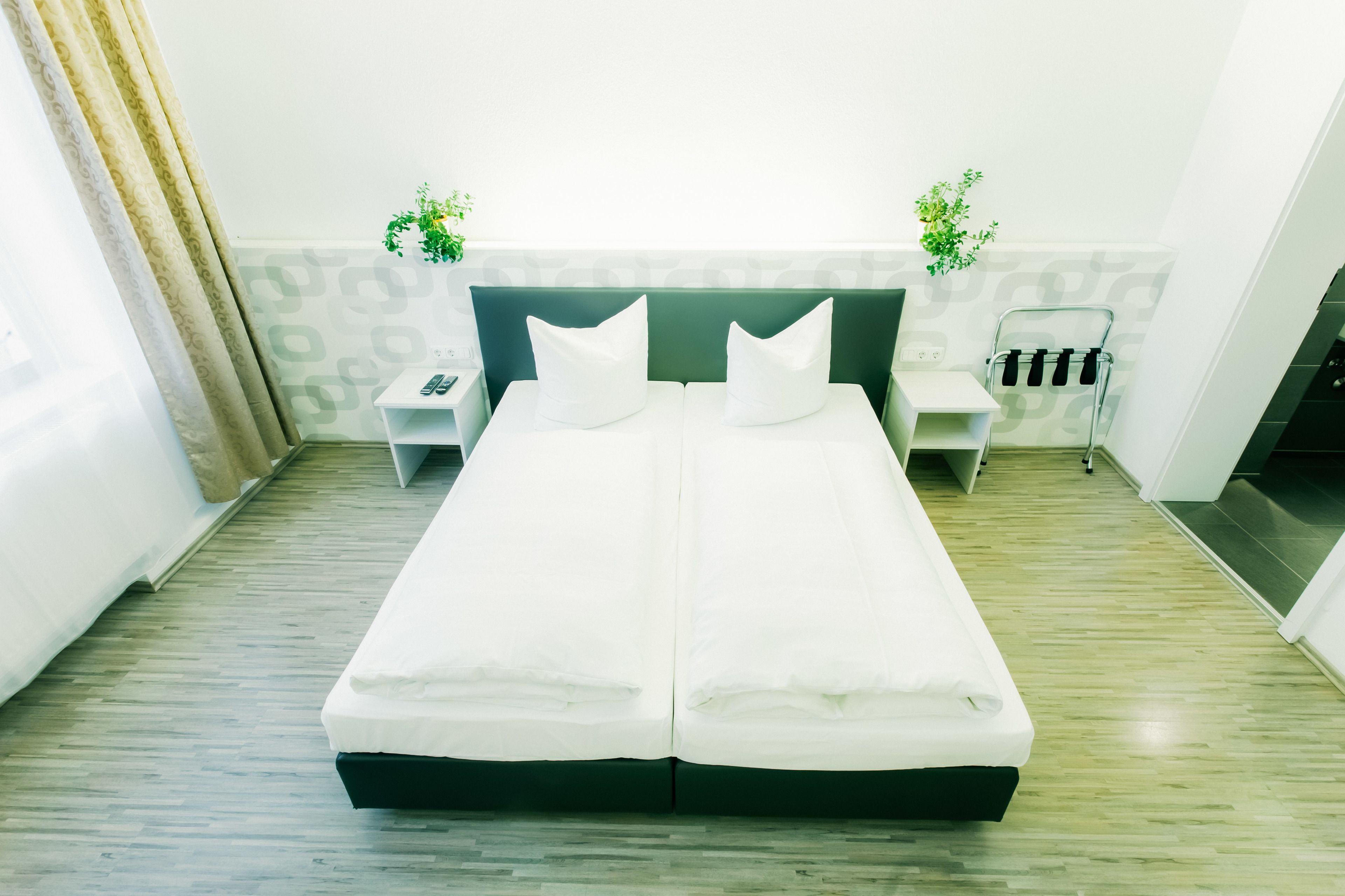 double or twin room | premium bedding, desk, blackout curtains, soundproofing