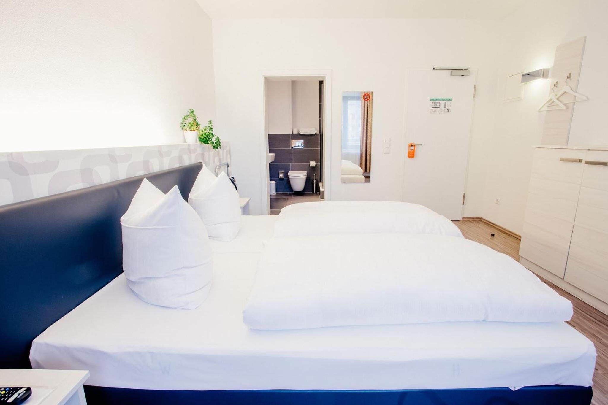 premium bedding, desk, blackout curtains, soundproofing